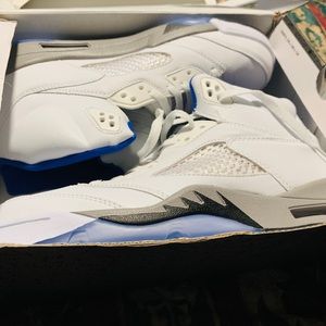 Blue and white Air Jordan 5s